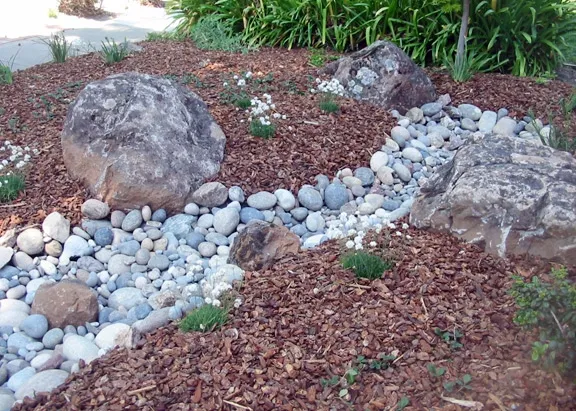 Dry creek bed drainage installation